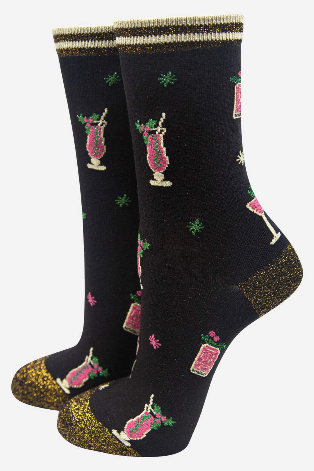 black socks with a pattern of pink cocktail glasses and gold sparkly heel, toe and cuff