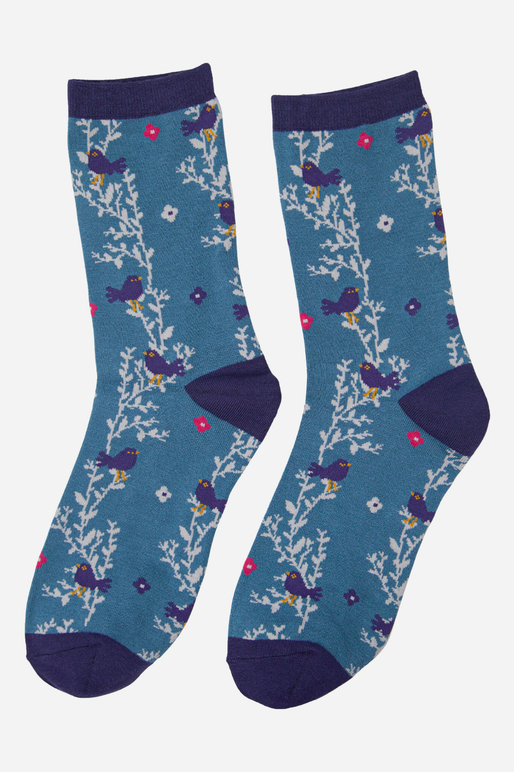 blue socks featuring blackbirds, vines and flowers