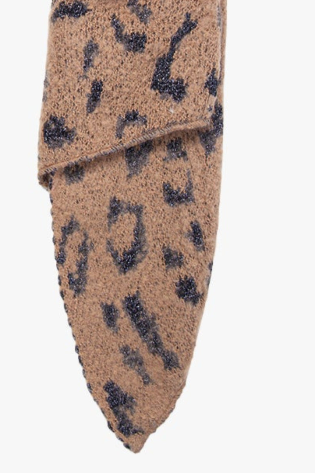 close up of the beige and black leopard print pattern