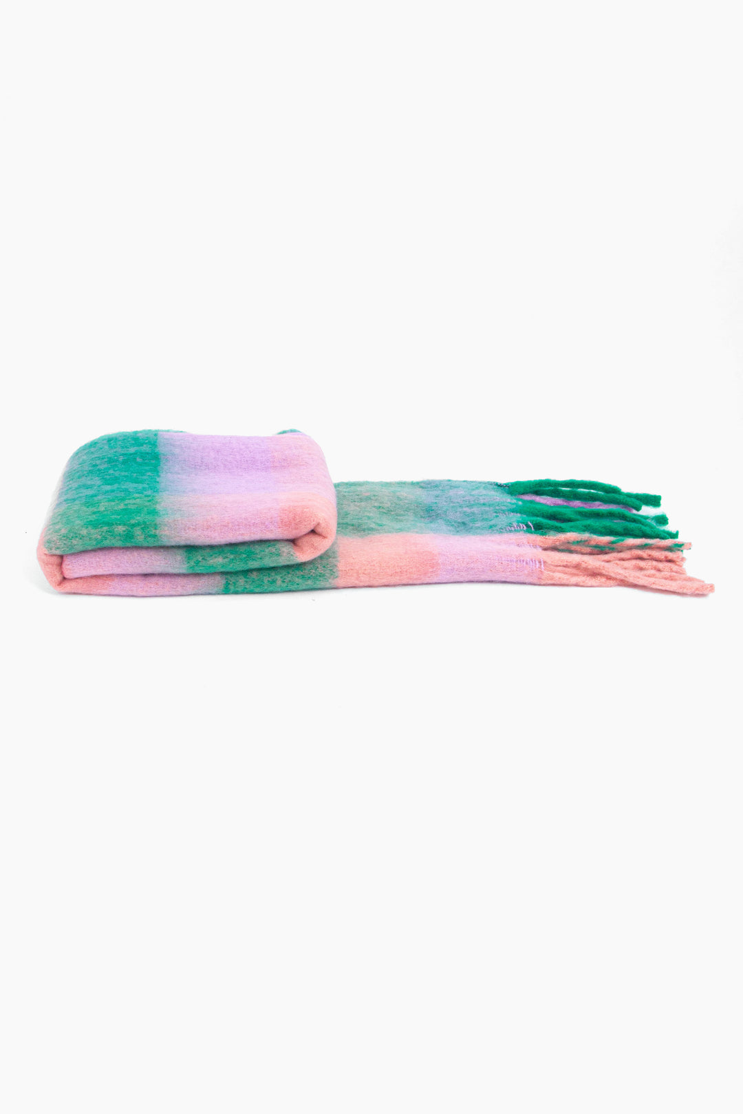 side view of the scarf when folder, showing the texture and thickness of the material. this scarf is warm and winter weight