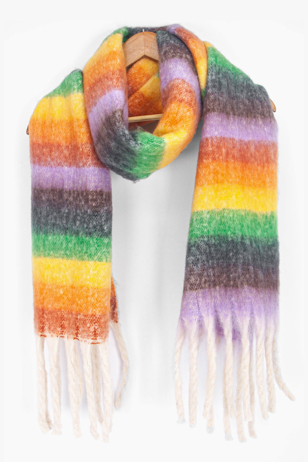 showing the multicoloured rainbow stripe winter scarf draped around a coat hanger, showing how it would look when worn.