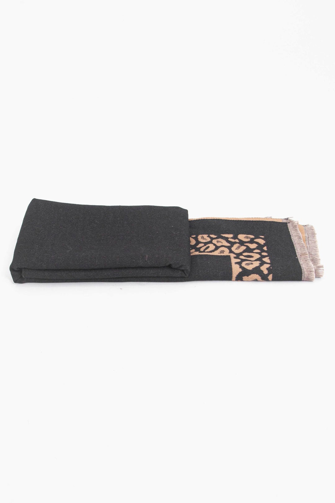 side view of the scarf when folder, showing the texture and thickness of the material. this scarf is warm and winter weight