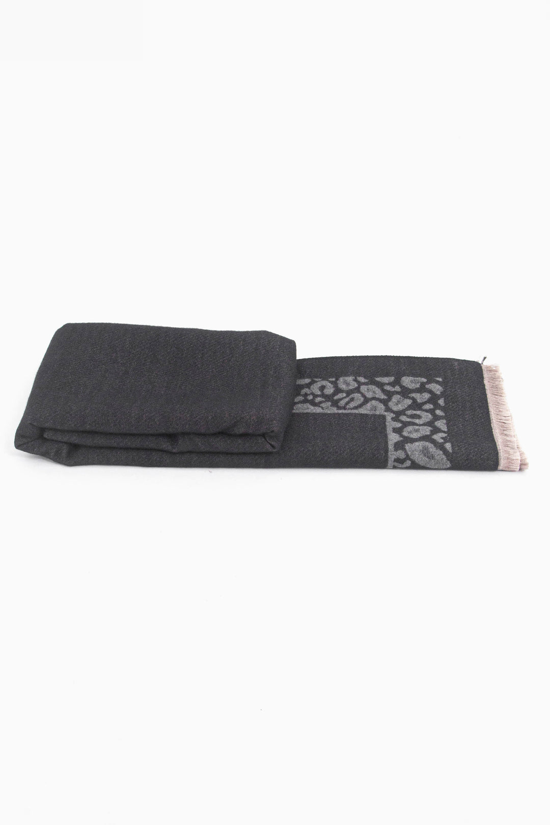 side view of the scarf when folder, showing the texture and thickness of the material. this scarf is warm and winter weight