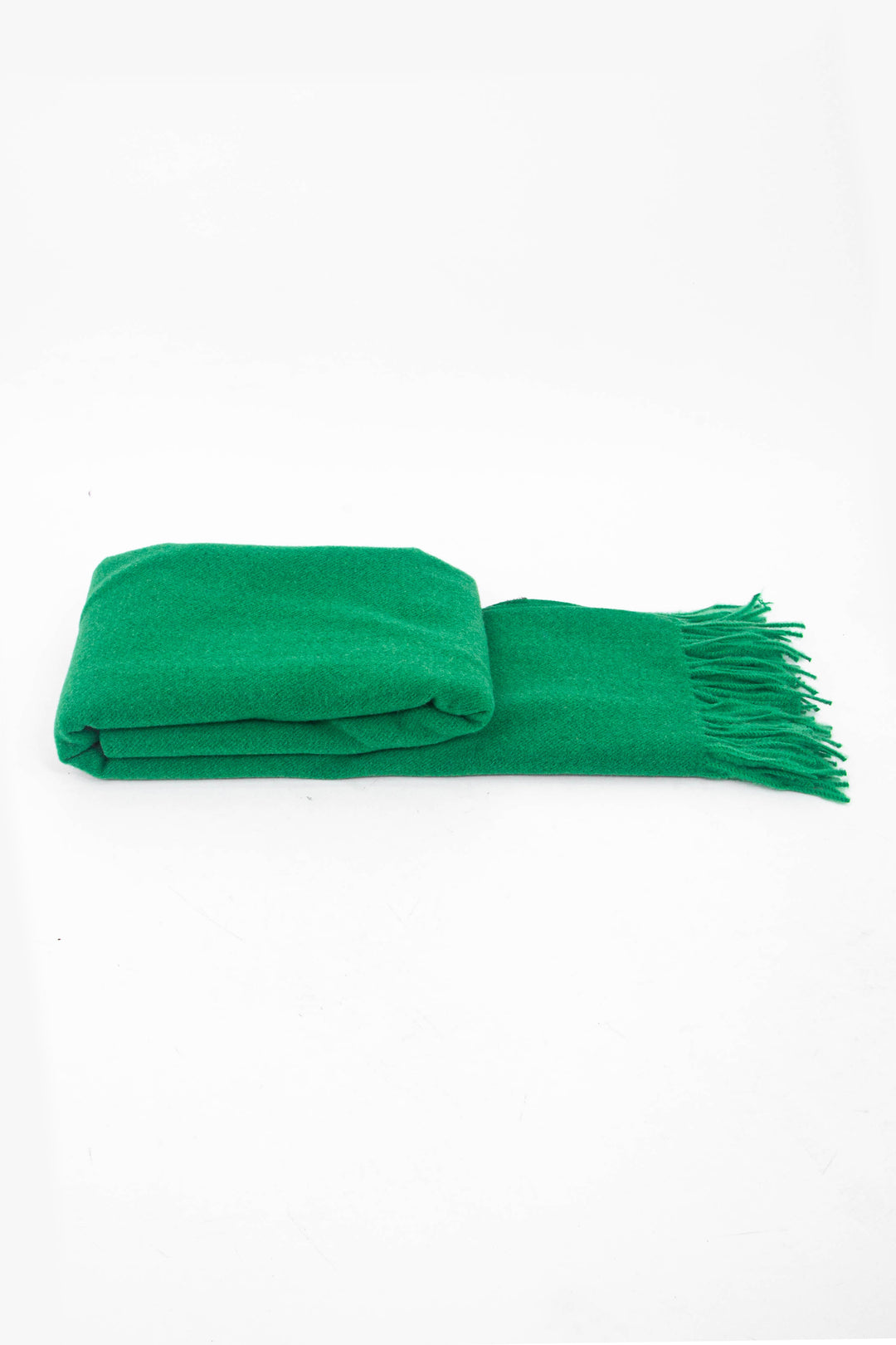side view of the scarf when folder, showing the texture and thickness of the material. this scarf is warm and winter weight