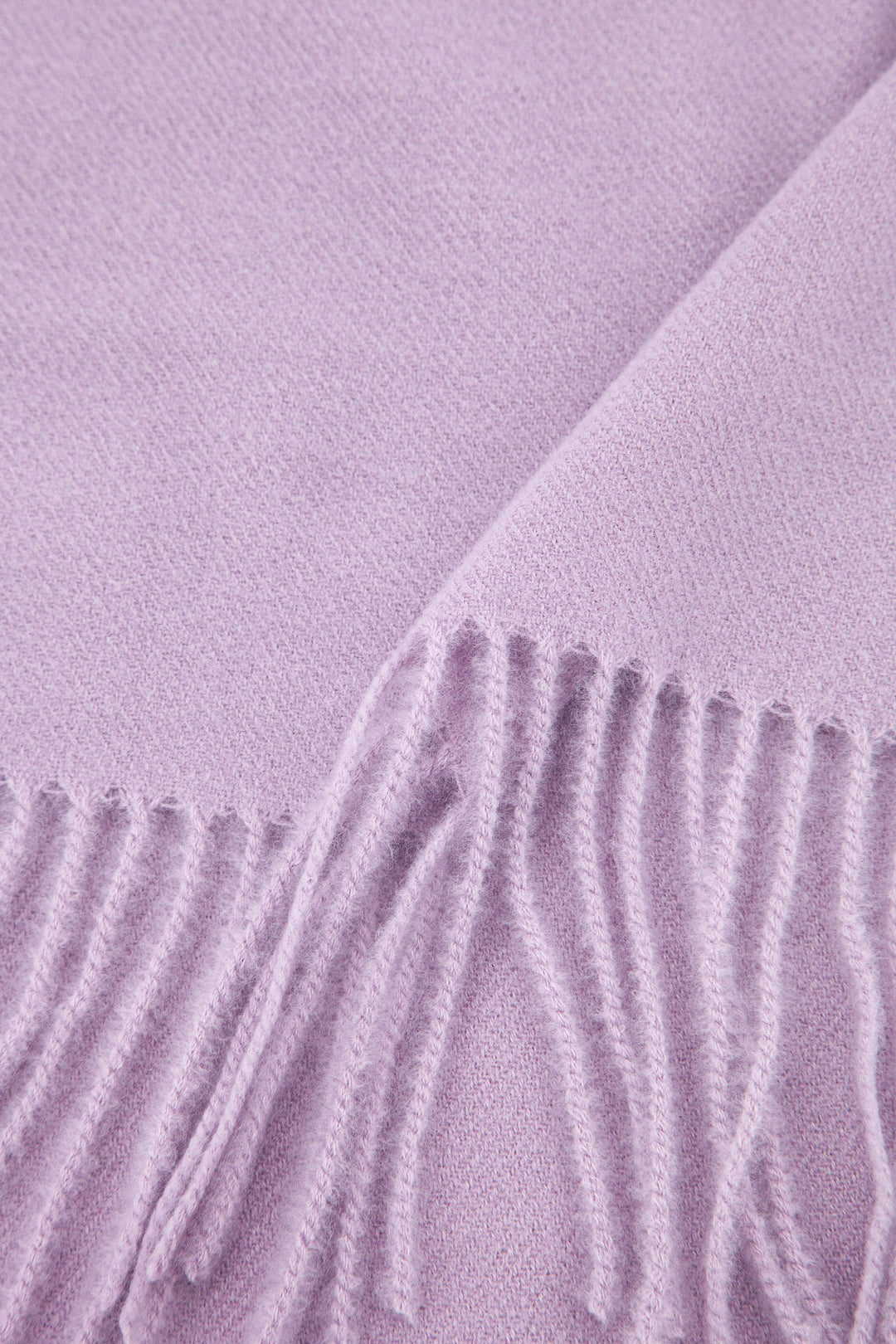close up of the soft viscose knitted material of the winter blanket scarf