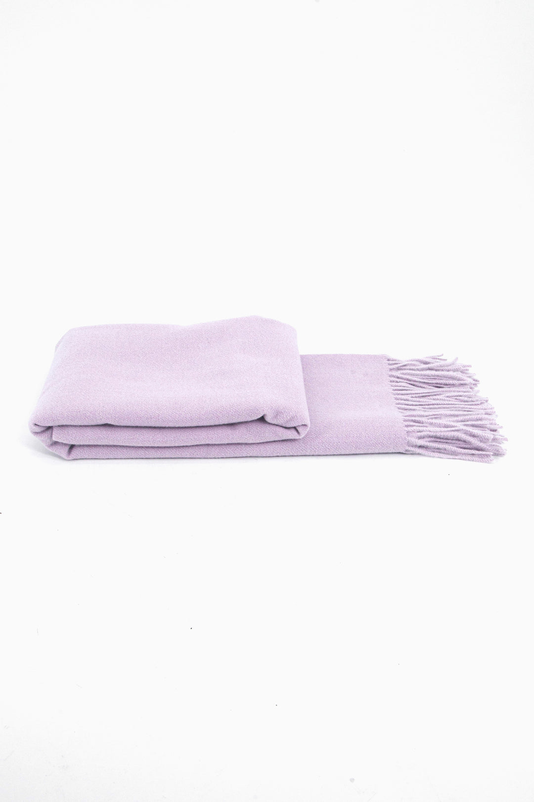side view of the scarf when folder, showing the texture and thickness of the material. this scarf is warm and winter weight