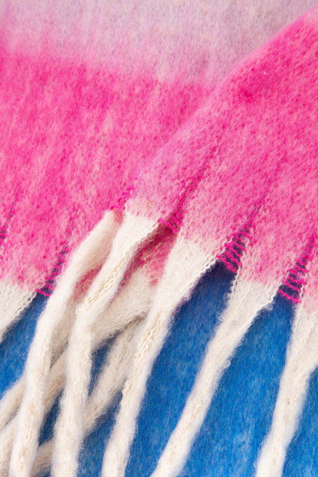 close up of the soft viscose knitted material of the winter blanket scarf