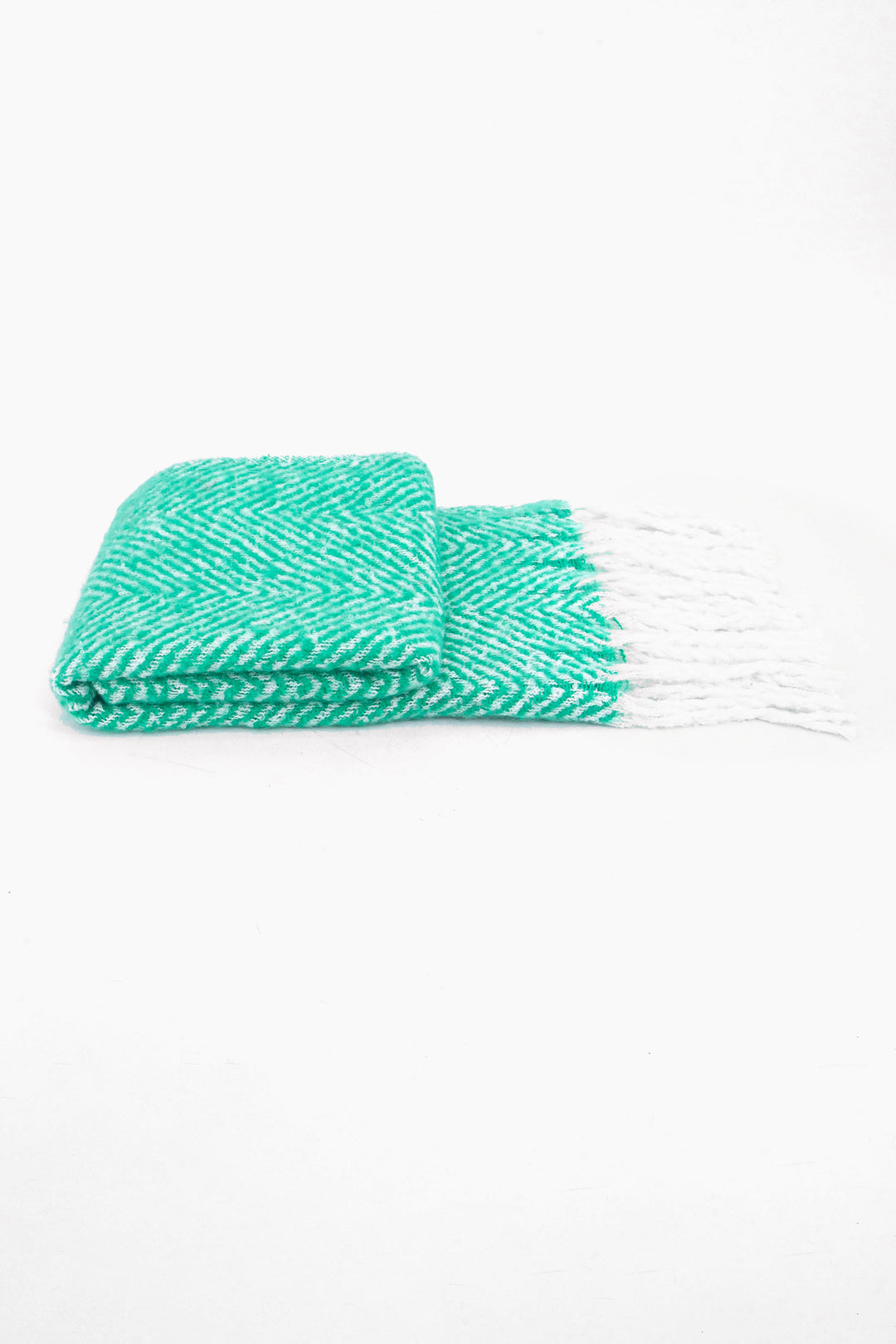 side view of the scarf when folder, showing the texture and thickness of the material. this scarf is warm and winter weight