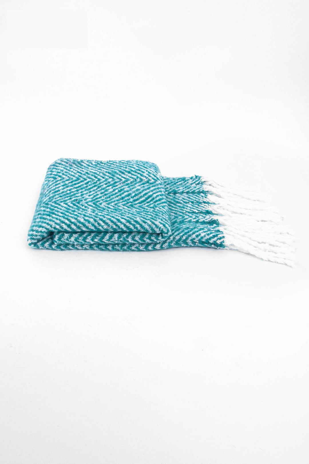side view of the scarf when folder, showing the texture and thickness of the material. this scarf is warm and winter weight