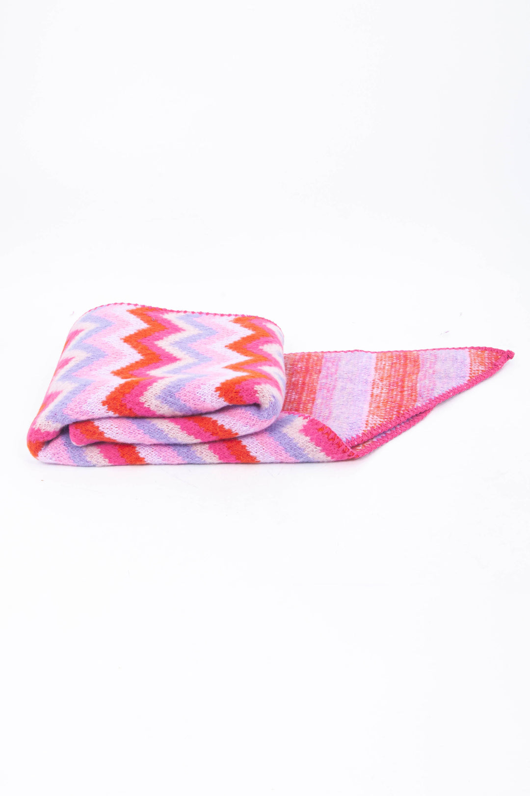 side view of the scarf when folder, showing the texture and thickness of the material. this scarf is warm and winter weight