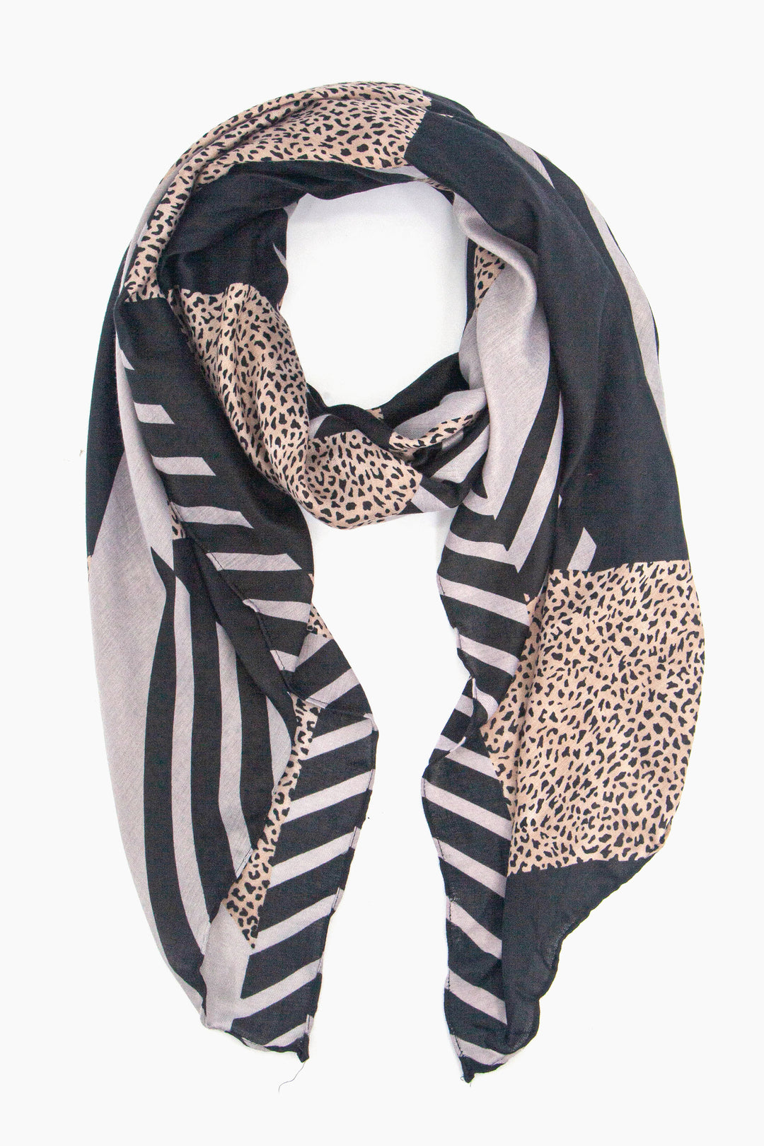 black and grey scarf in a block print pattern with striped and contrasting neutral animal print