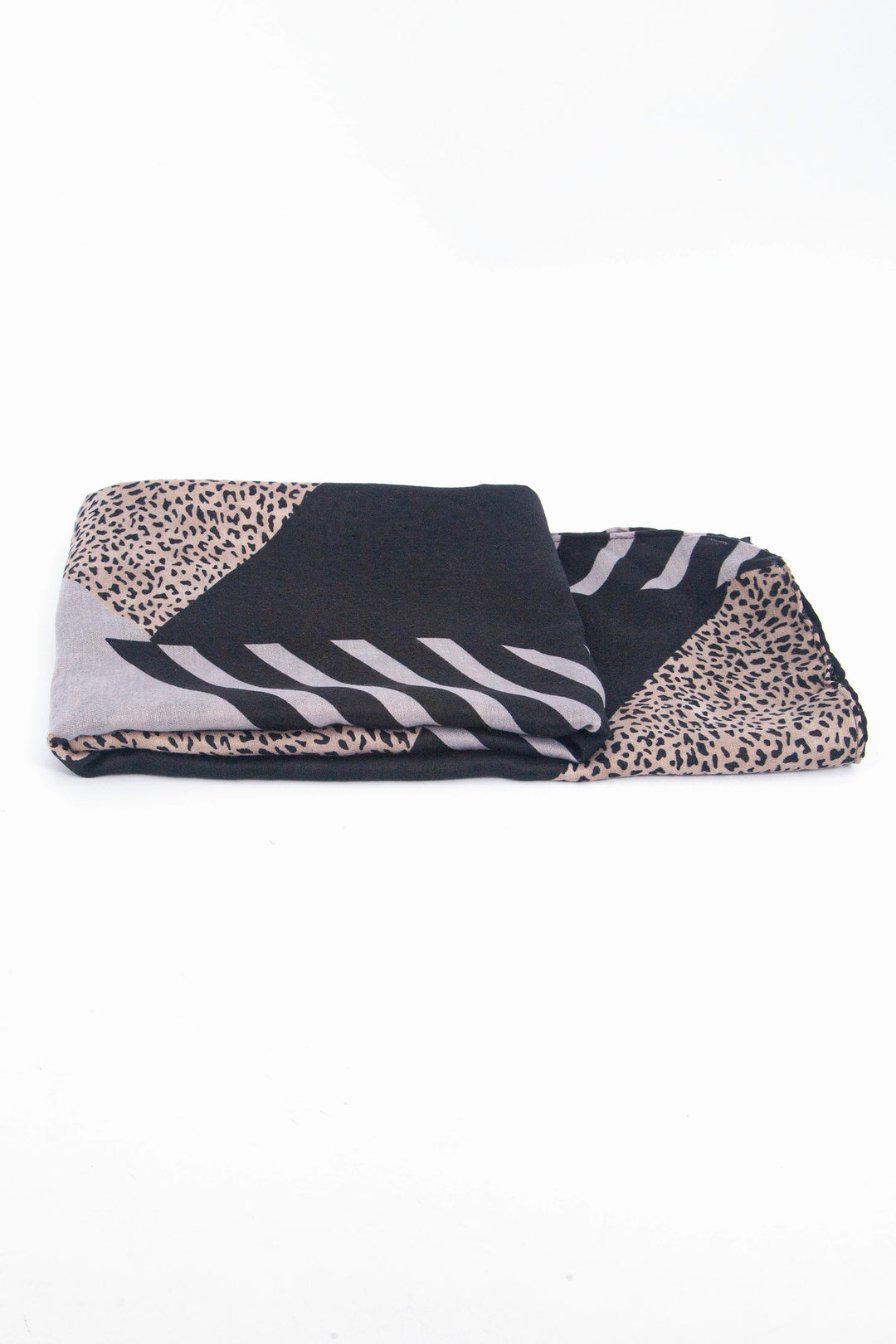 side view of the scarf when folded, showing the texture and thickness of the material. this scarf is lightweight