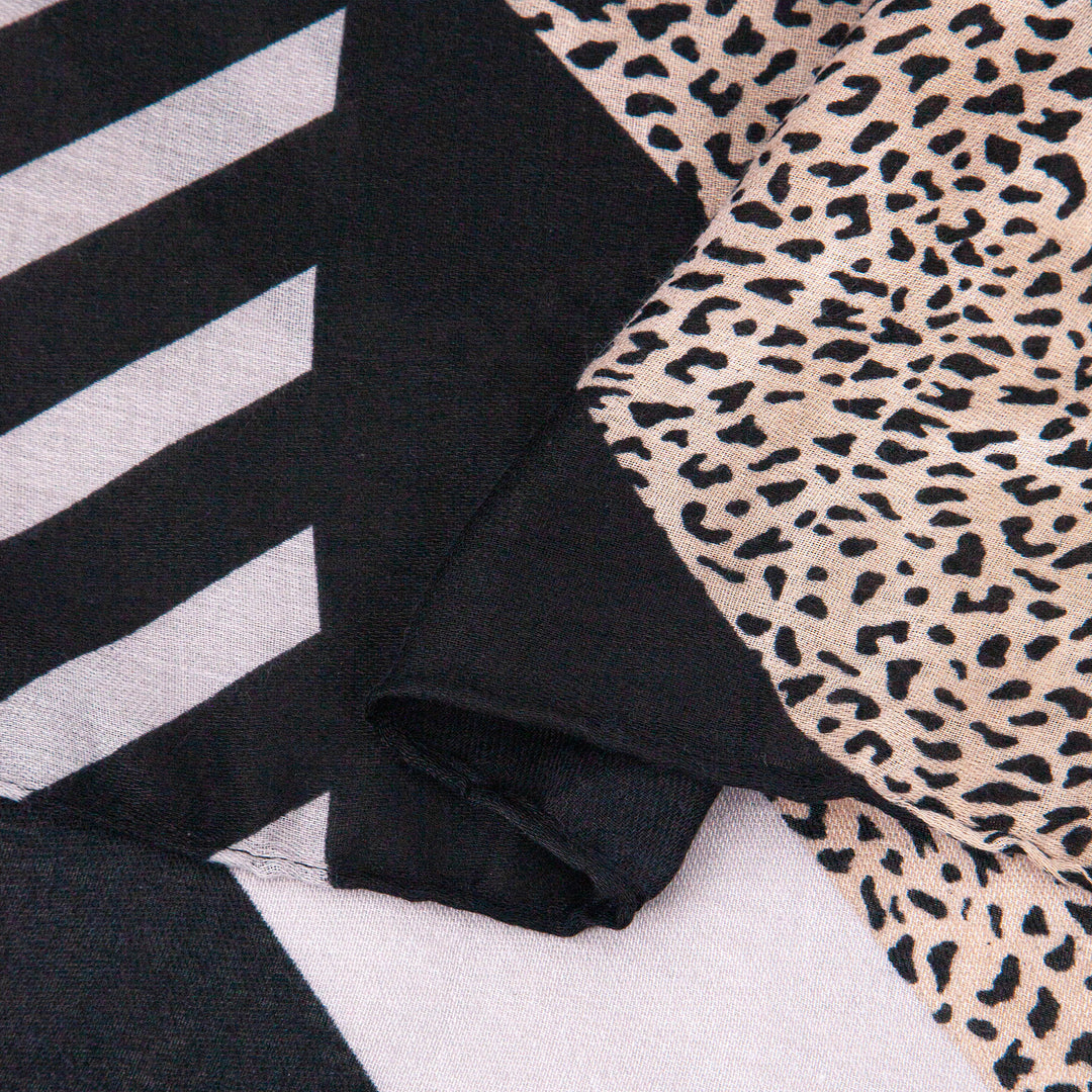 close up of the soft viscose fabric, the contrasting print is clearly visible