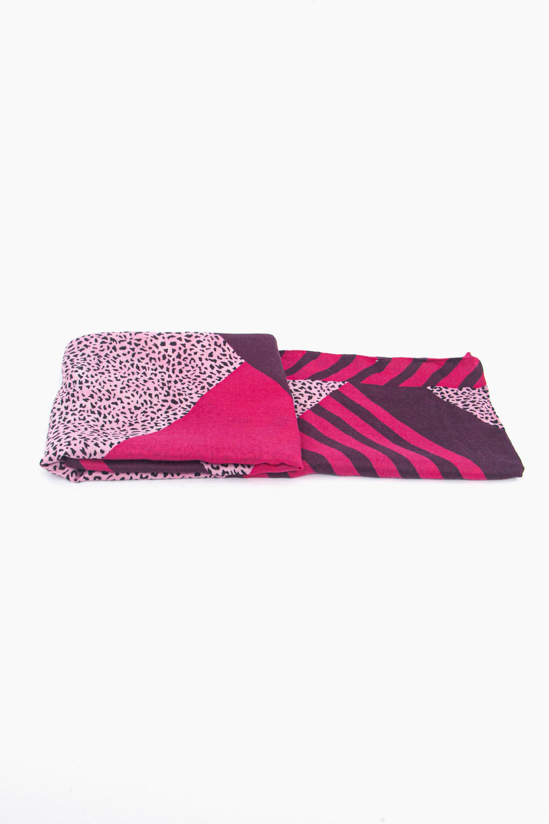 side view of the scarf when folded, showing the texture and thickness of the material. this scarf is lightweight