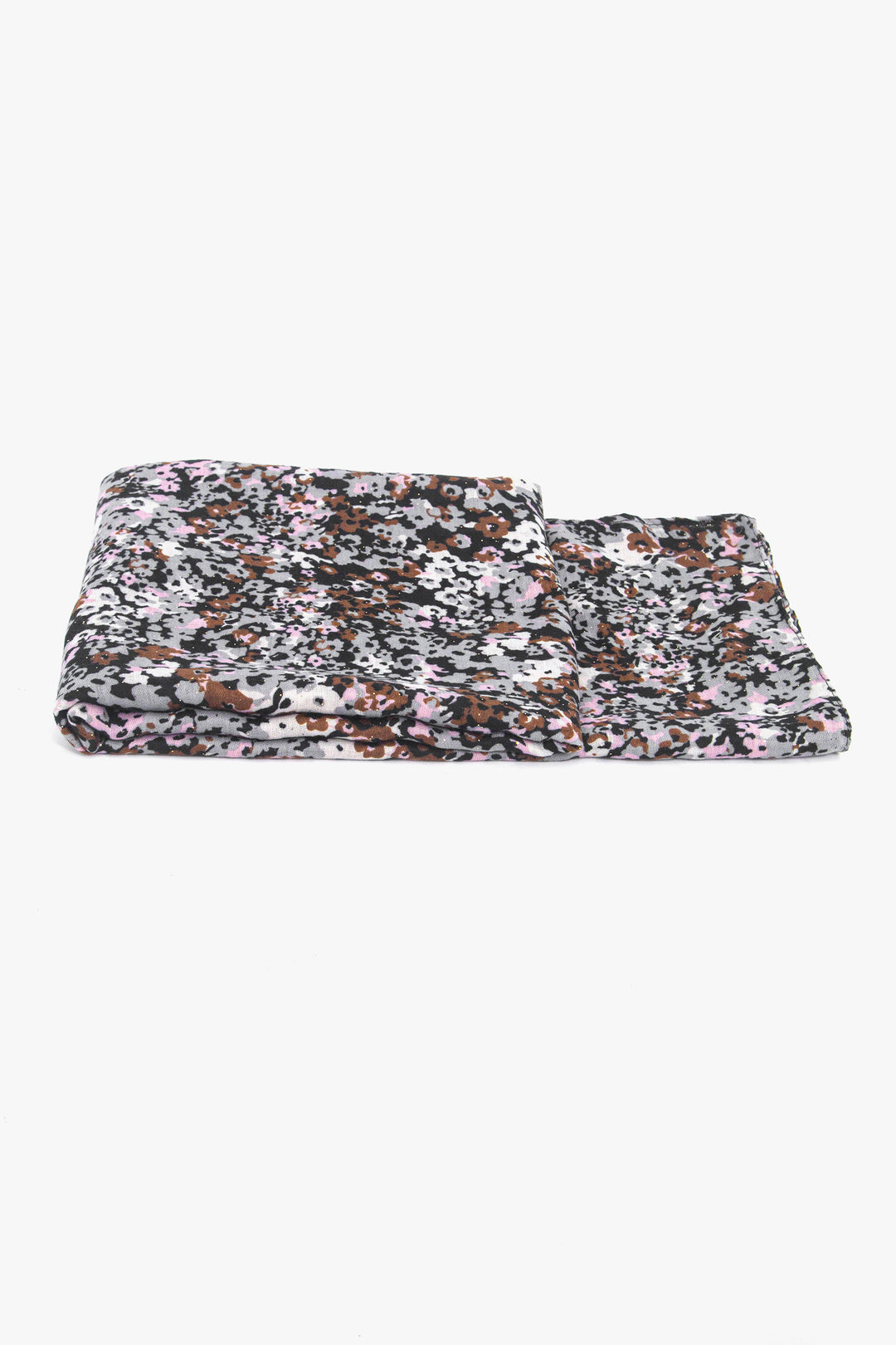 side view of the scarf when folded, showing the texture and thickness of the material. this scarf is lightweight