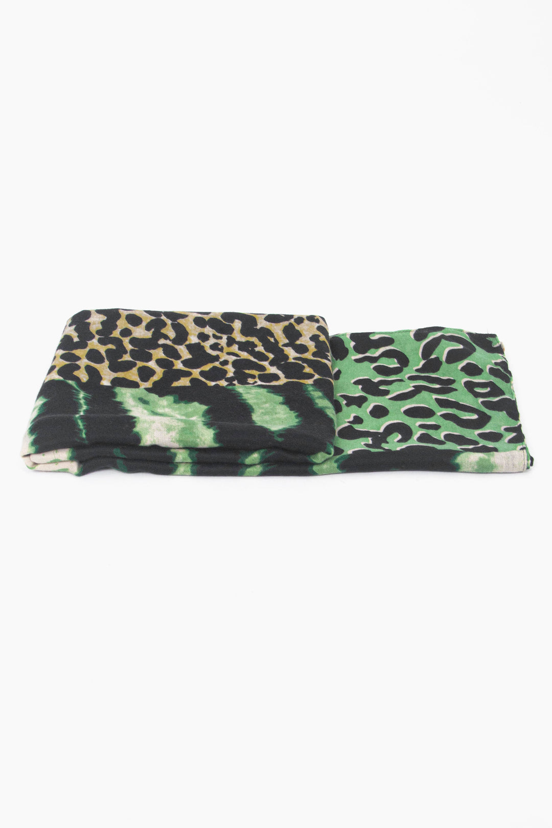 side view of the scarf when folded, showing the texture and thickness of the material. this scarf is lightweight
