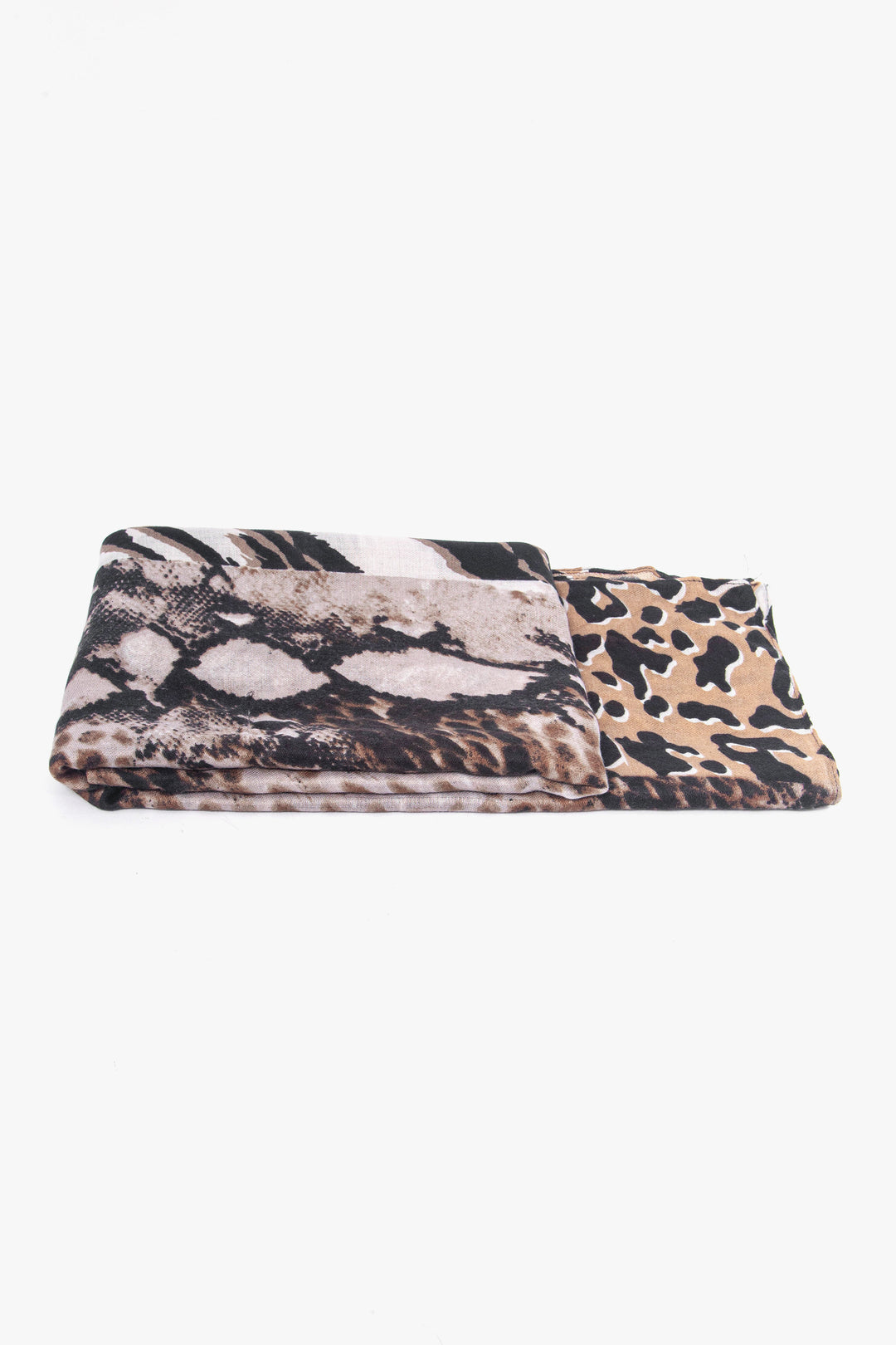 side view of the scarf when folded, showing the texture and thickness of the material. this scarf is lightweight