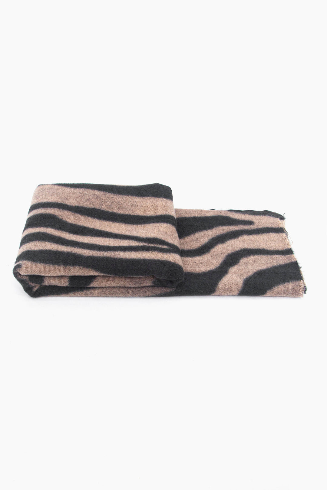 side view of the scarf when folded, showing the texture and thickness of the material. this scarf is lightweight