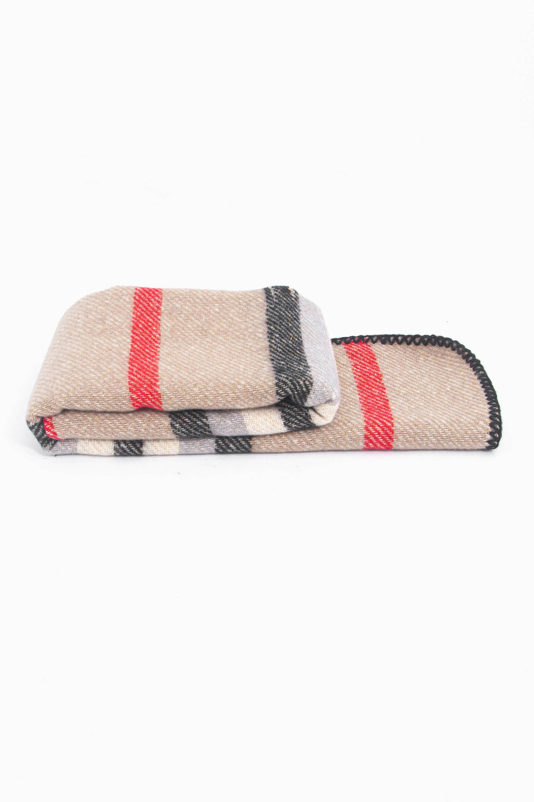 side view of the scarf when folder, showing the texture and thickness of the material. this scarf is warm and winter weight
