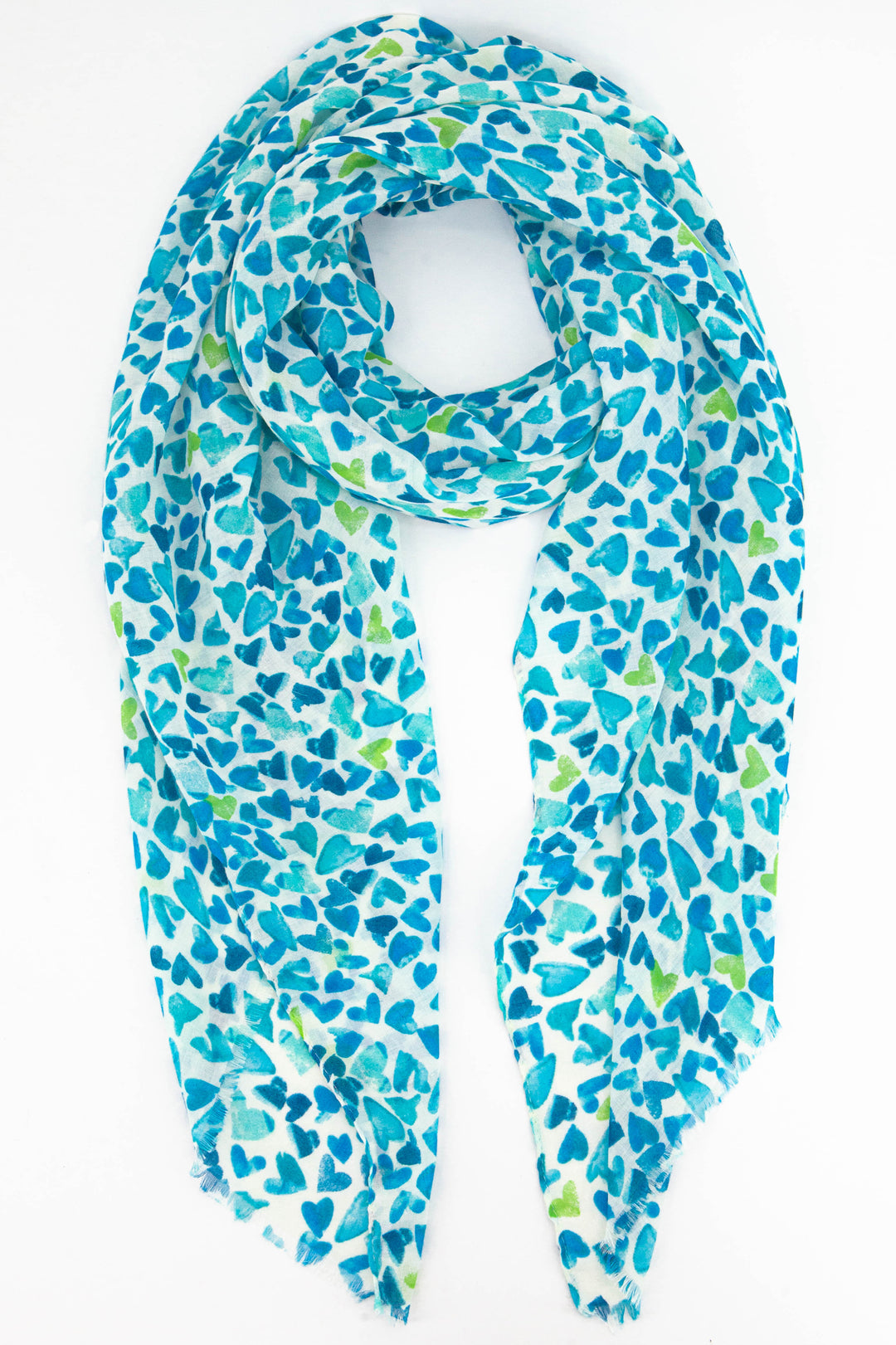 lightweight summer scarf with an all over pattern of blue and green love hearts which look like they have been hand sketched