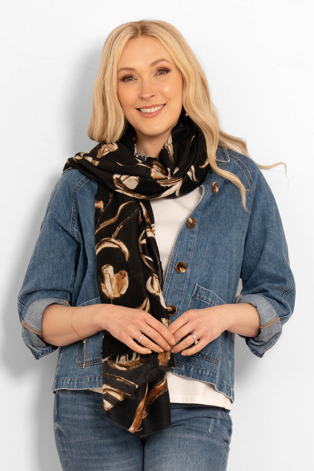 ashley-lightweight-scarf-black-large-floral-draped-over-models-shoulder