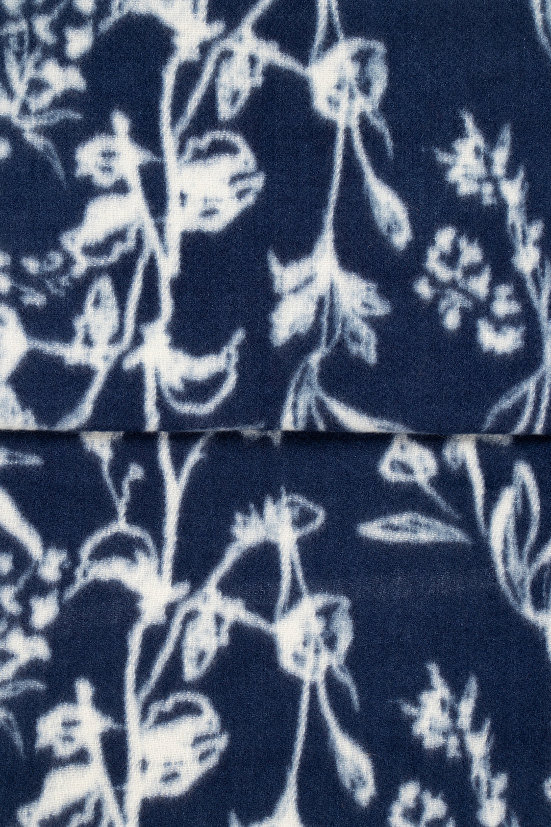 close up of the soft viscose fabric, the navy blue and white colourways are clearly visible