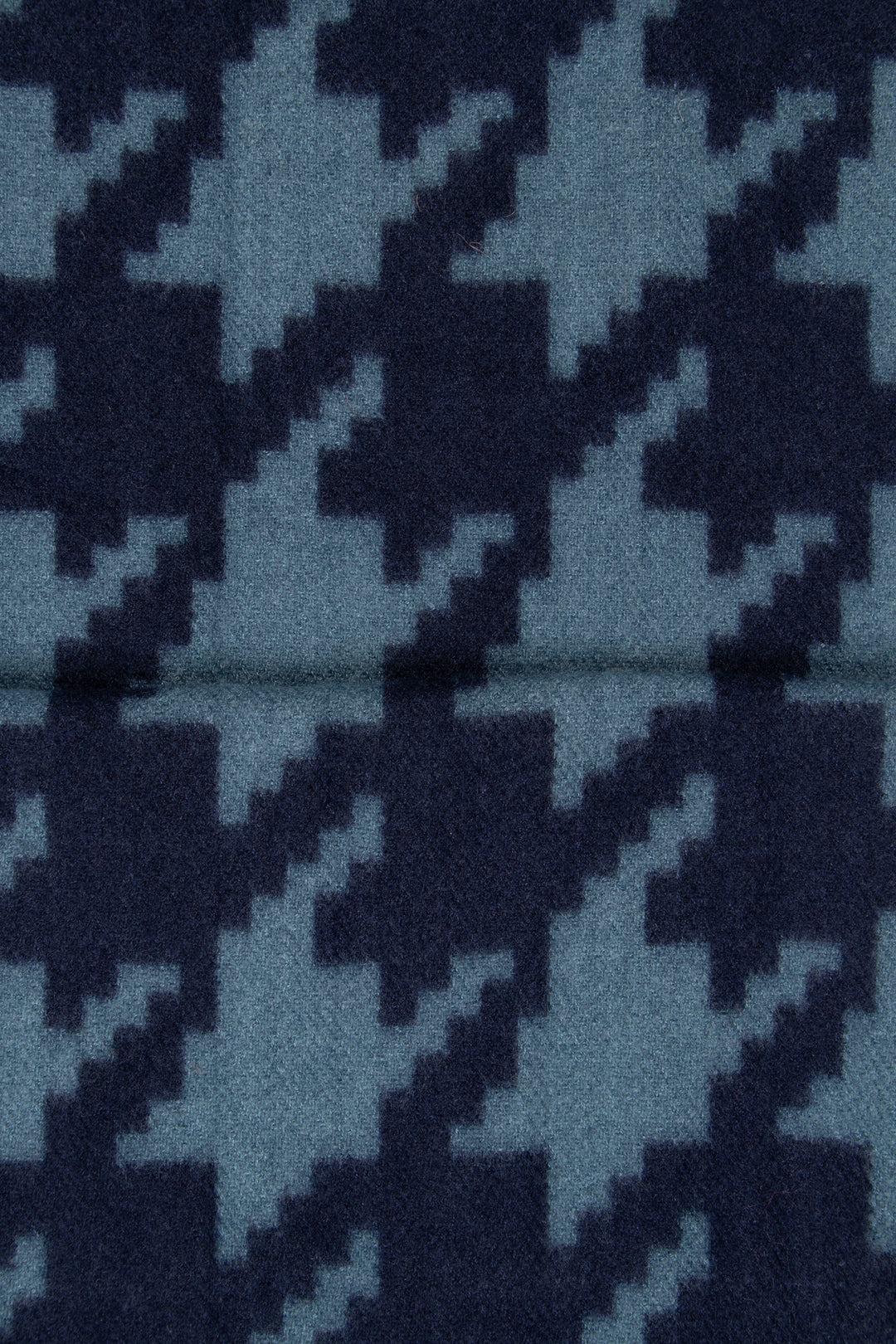 close up of the soft viscose fabric, the navy and teal colourways are clearly visible