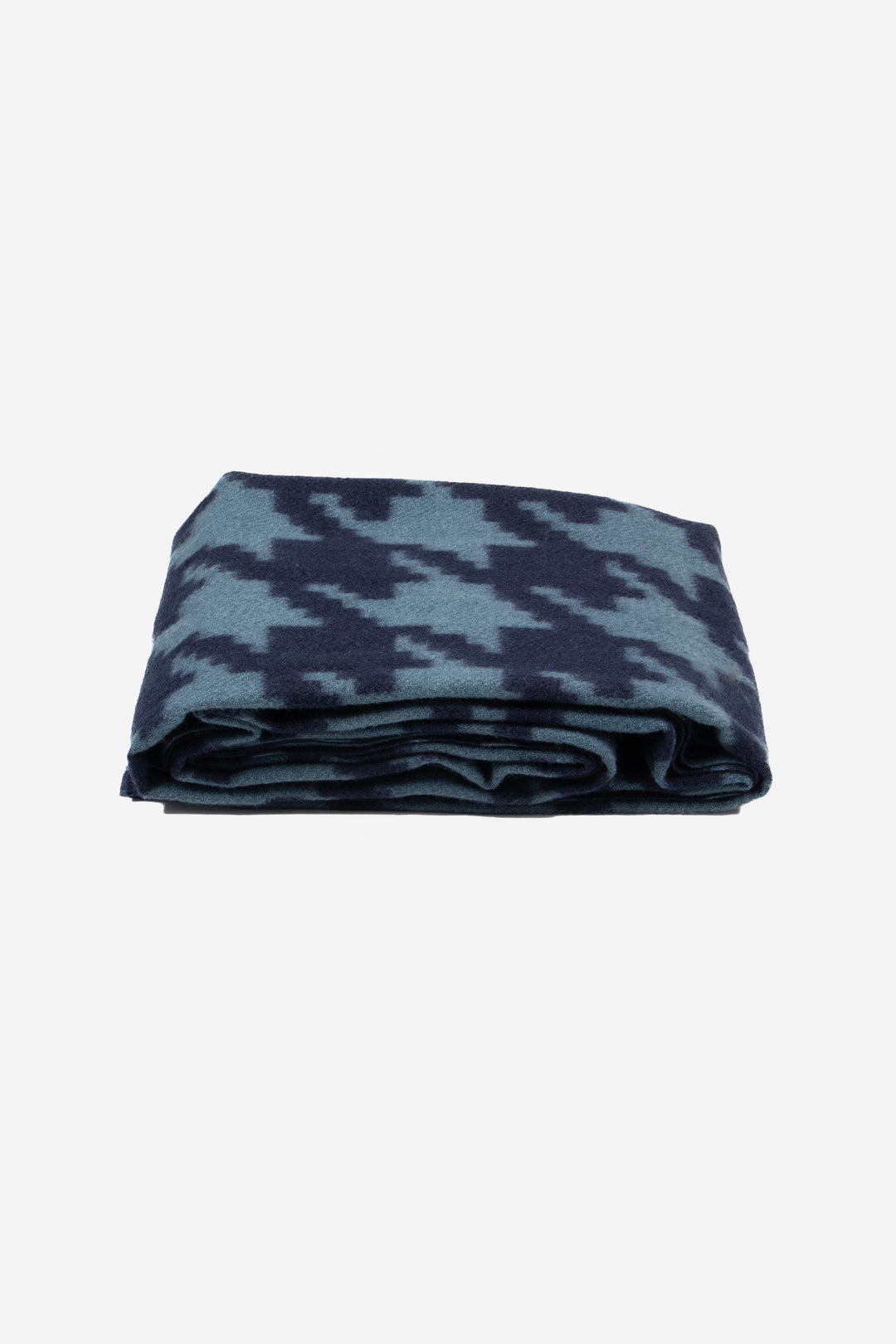 side view of the scarf when folded, showing the texture and thickness of the material. this scarf is midweight