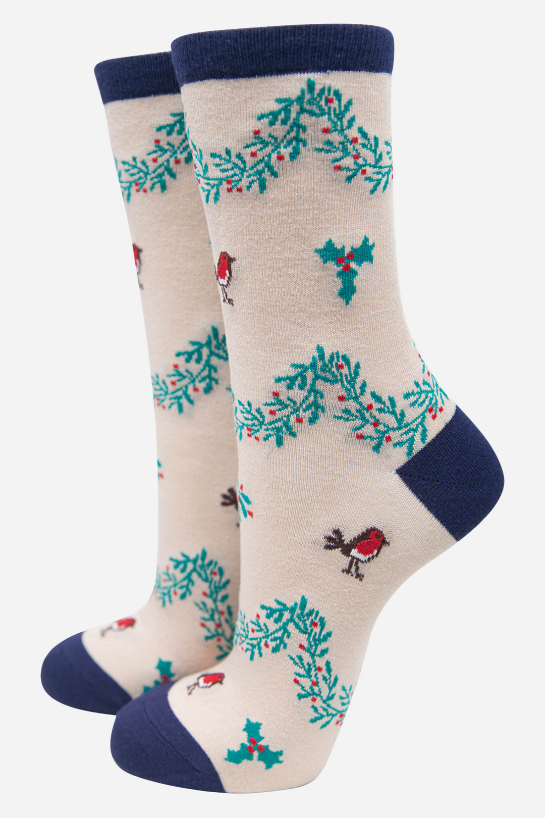 cream socks with a navy blue heel, toe and cuff with an pattern of red robin birds and hanging boughs of holly