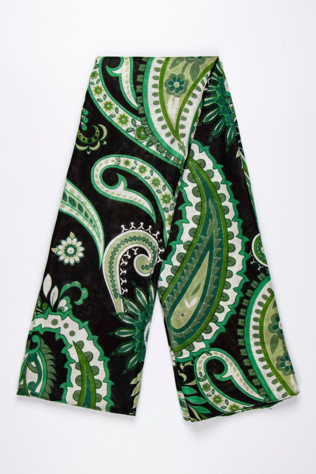 showing the scarf folded, the green and black bold paisley floral pattern is shown
