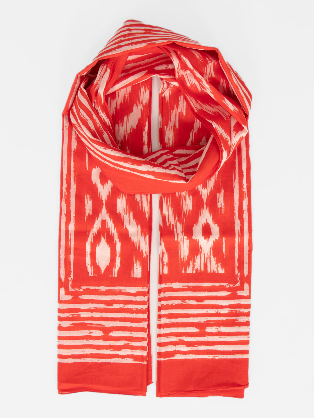 red cotton lightweight aztec scarf. the scarf has an all over pattern and a large bordered edge.
