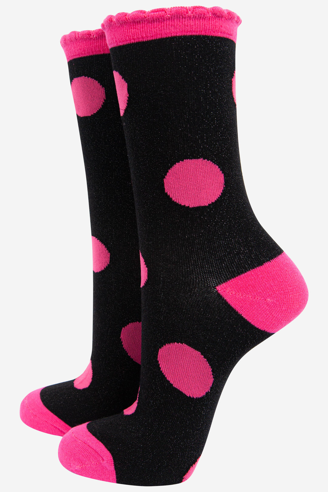black and pink glitter ankle socks with an all over large polka dot spot pattern and sparkly shimmer, the socks have scalloped edge cuffs