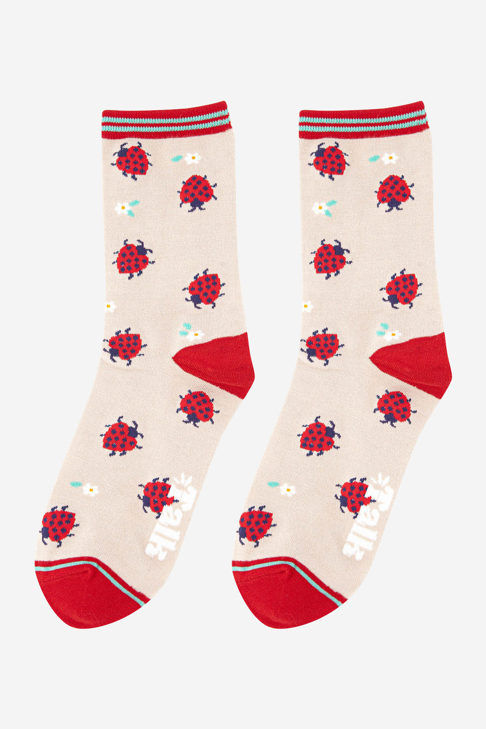 cream and red bamboo socks featuring ladybirds and flowers