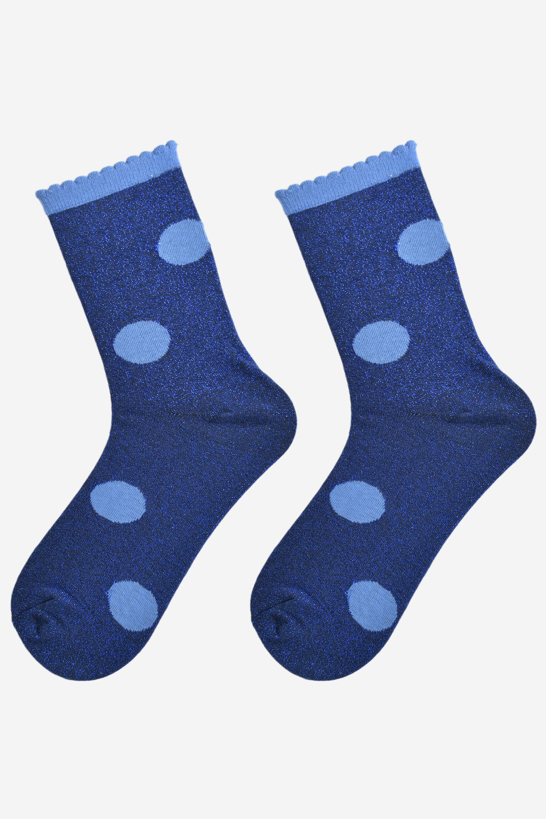 showing the blue polka dot socks laying flat, they have an all over blue glitter sparkle and frilled scalloped cuffs.