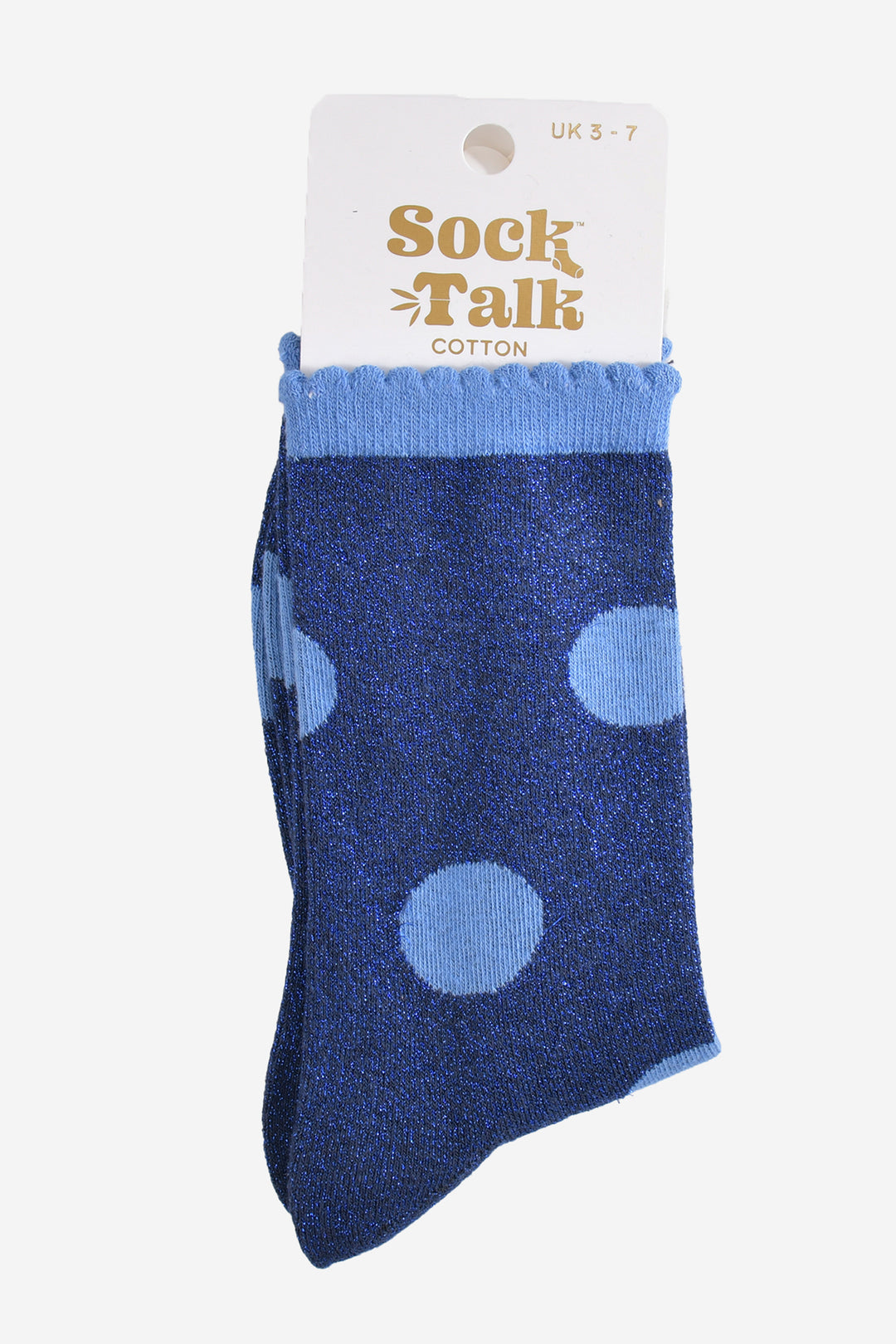 blue glitter polka dot socks in their sock talk packaging, these socks are a uk size 3-7