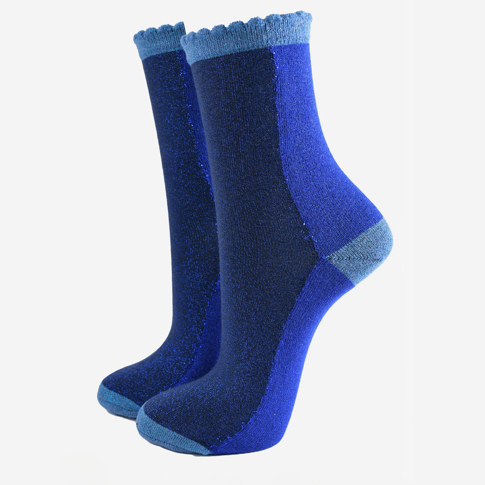 royal blue and navy colour block socks with a light blue heel, toe and cuff with an all over glitter sparkle and scalloped edge