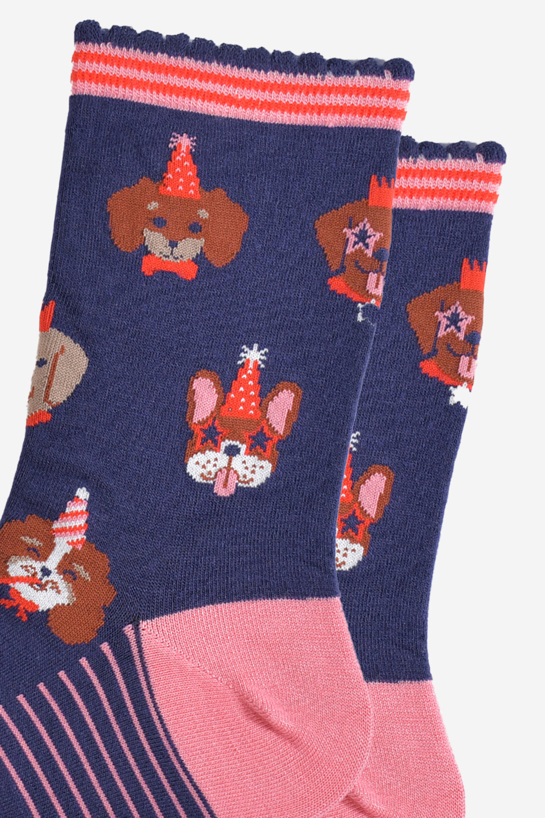 close up of the party dog pattern, there are french bulldogs, spaniels and labradors all wearing party hats