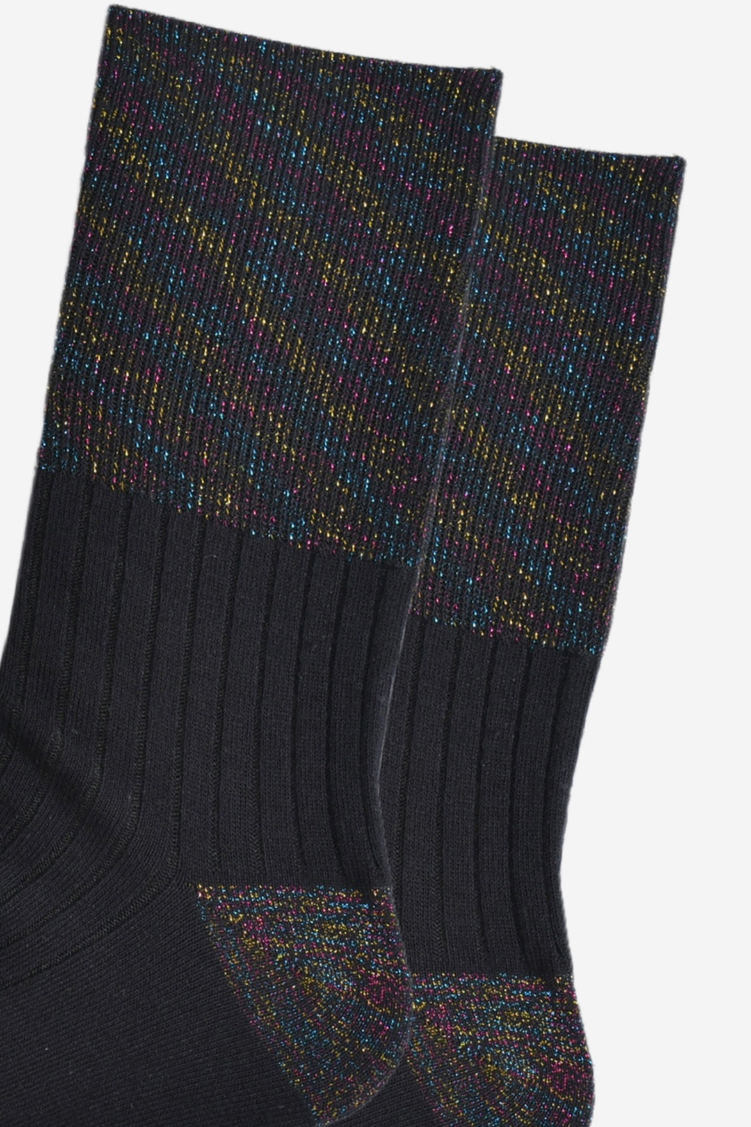close up of the black rainbow glitter folding cuff on the black cotton socks. showing an all over rainbow sparkle
