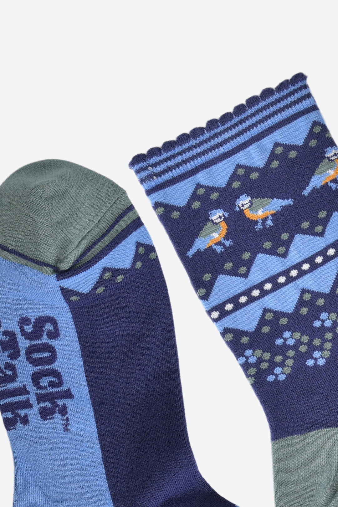 close up of the green toe and blue scalloped stripe cuff on the blue tit bird socks