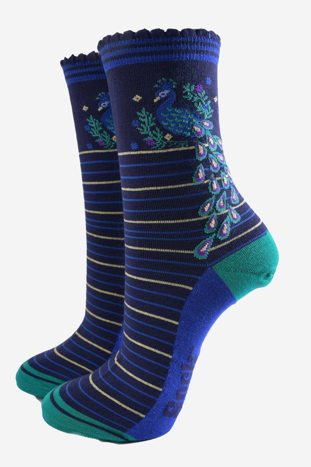 striped blue and gold bamboo socks with a peacock with a large fan tail and seasonal wreath.