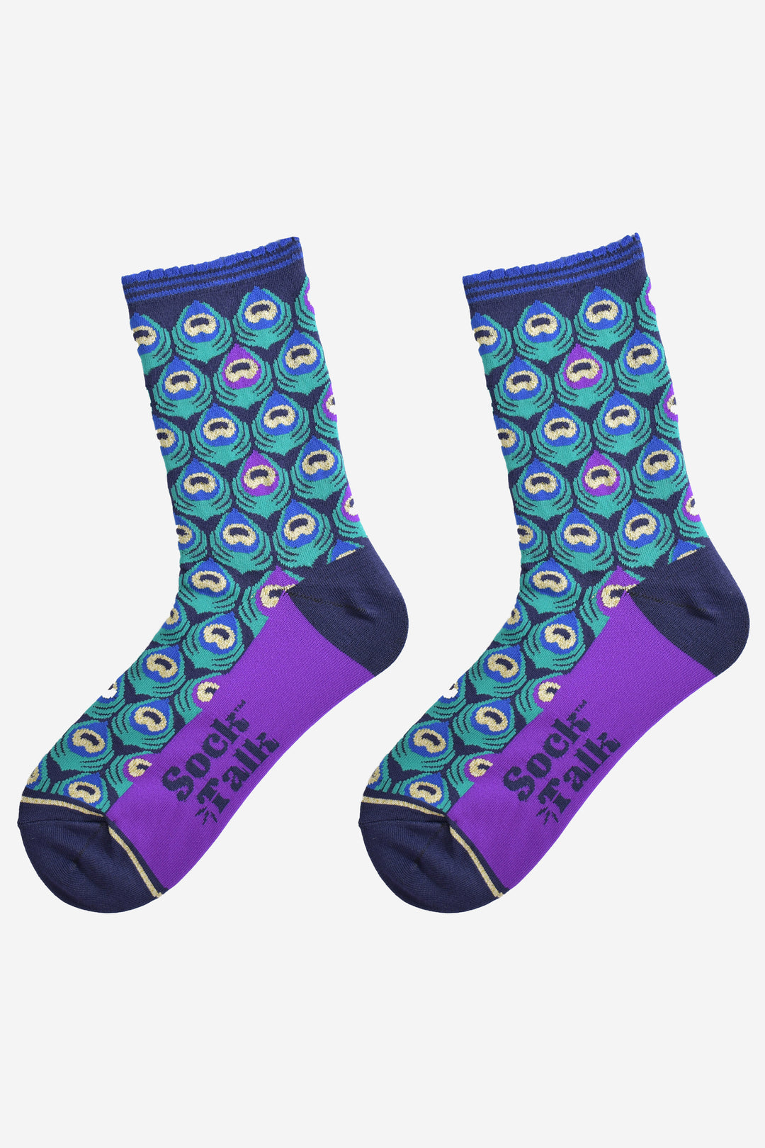 showing the peacock feather socks laying flat, the peacock fan print is all over the socks, the sole is purple and the heel and toe are navy blue