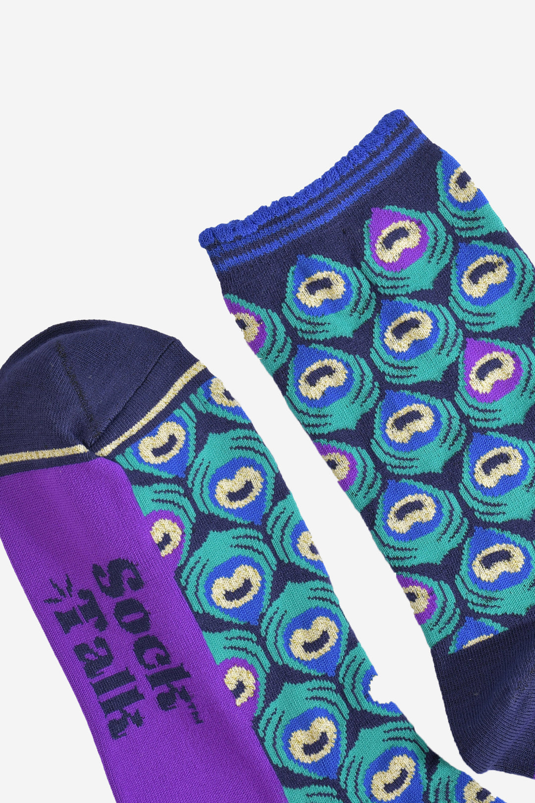 close up of the toe and cuff, the toe is navy blue with a gold striped edge, the cuff is scalloped with a royal blue and navy stripe