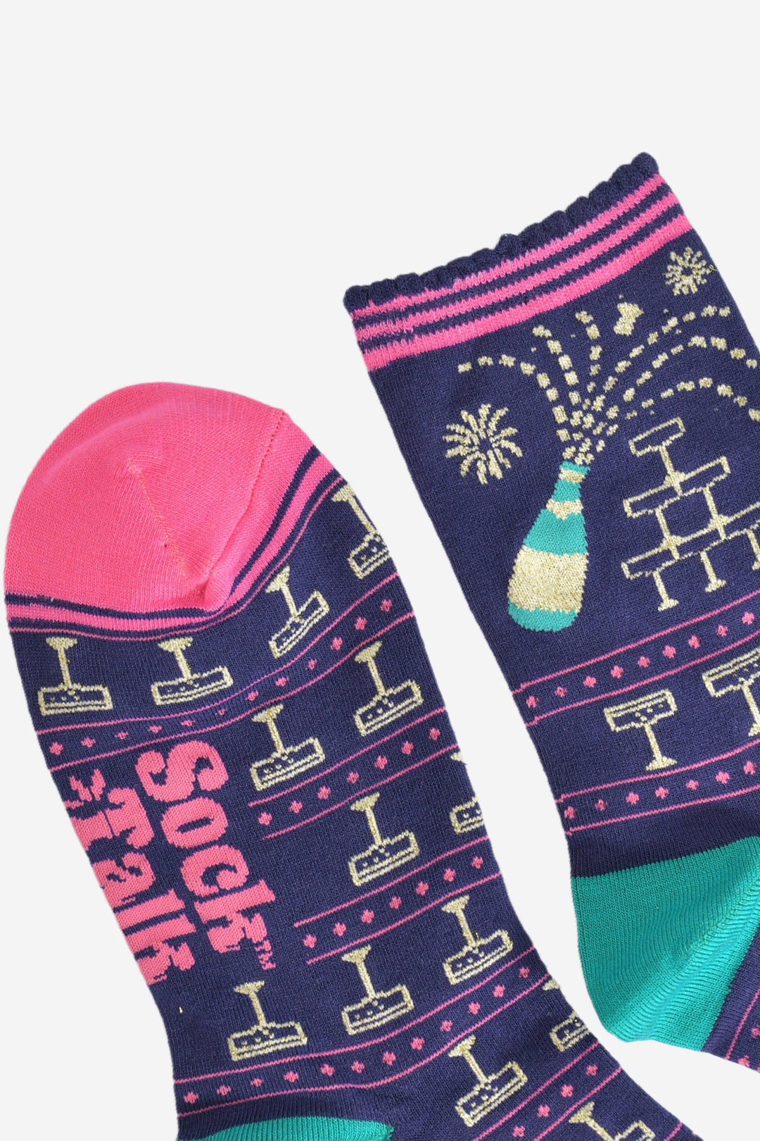 close up of the toe and cuff, the toe is pink with a navy striped border, the cuff is scalloped and is navy and pink striped