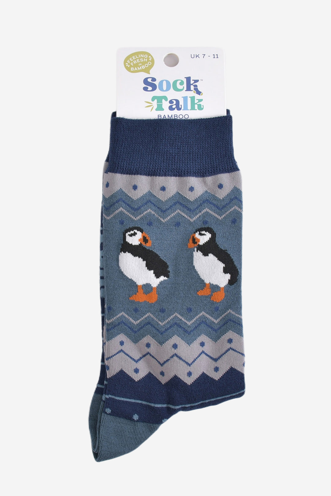 teal blue puffin fair isle socks in their sock talk packaging, these socks are a uk size 7-11