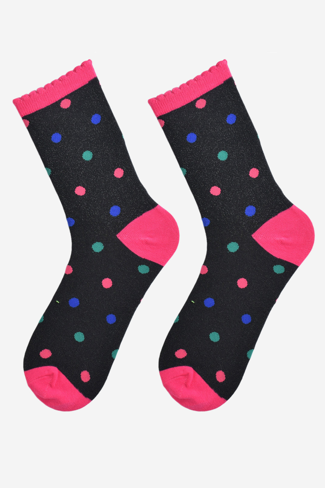 showing the multicoloured polka dot glitter socks laying flat, the all over silver sparkle is visible