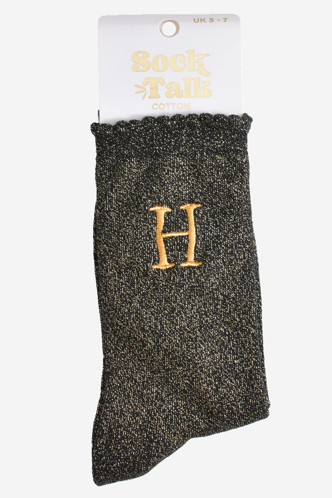embroidered glitter letter h cotton ankle socks in their sock talk packaging, the socks are a uk size 3-7