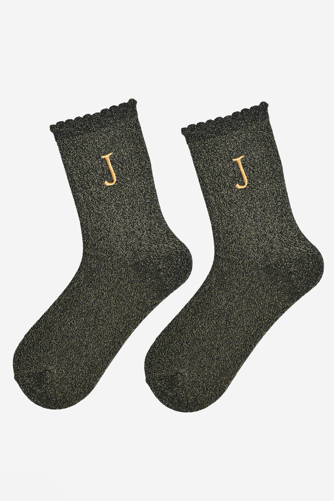 showing the glitter socks laying flat, they have a scalloped cuff and an all over gold sparkle