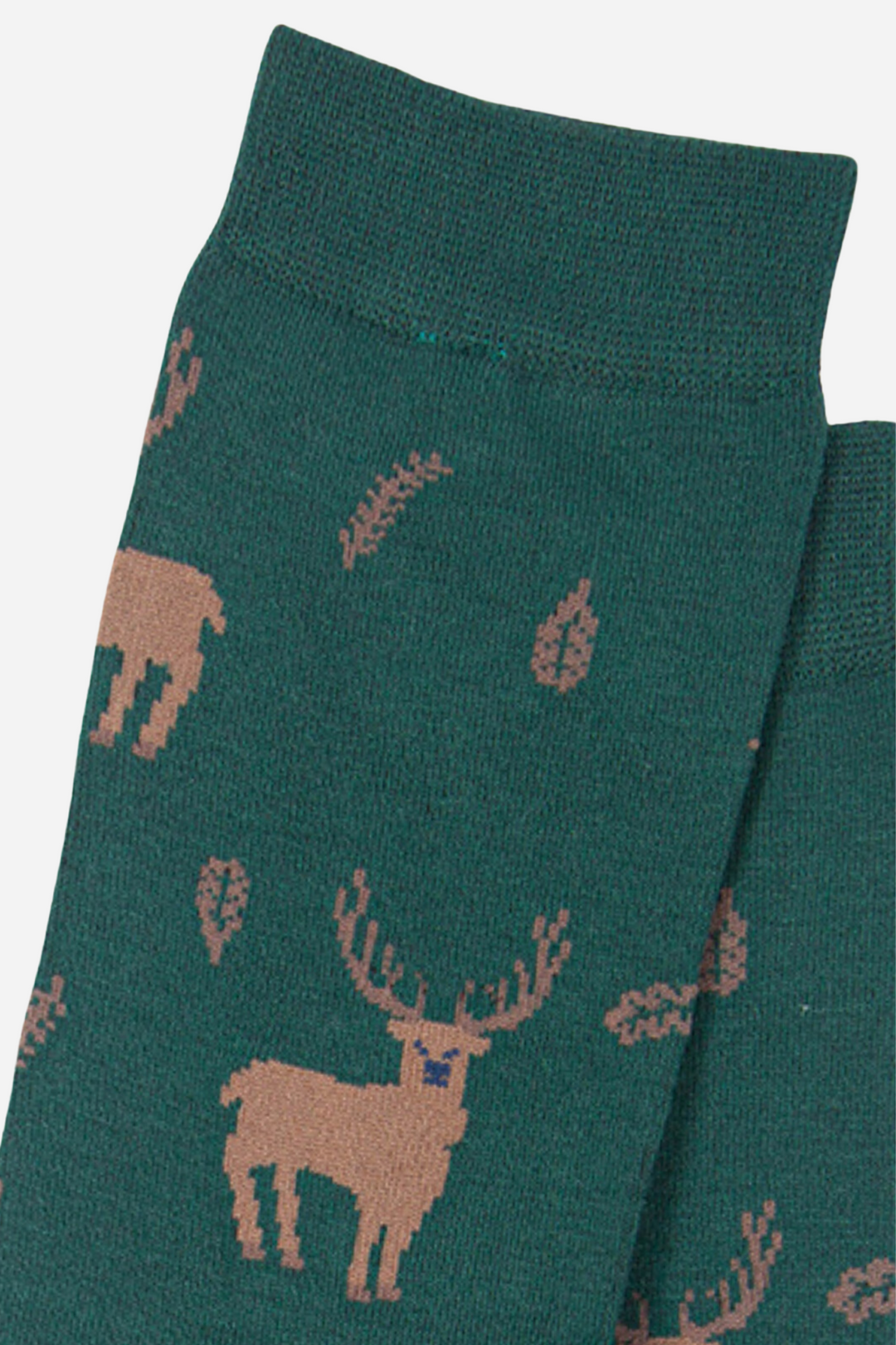 close up of the stag and leaf pattern on the green socks