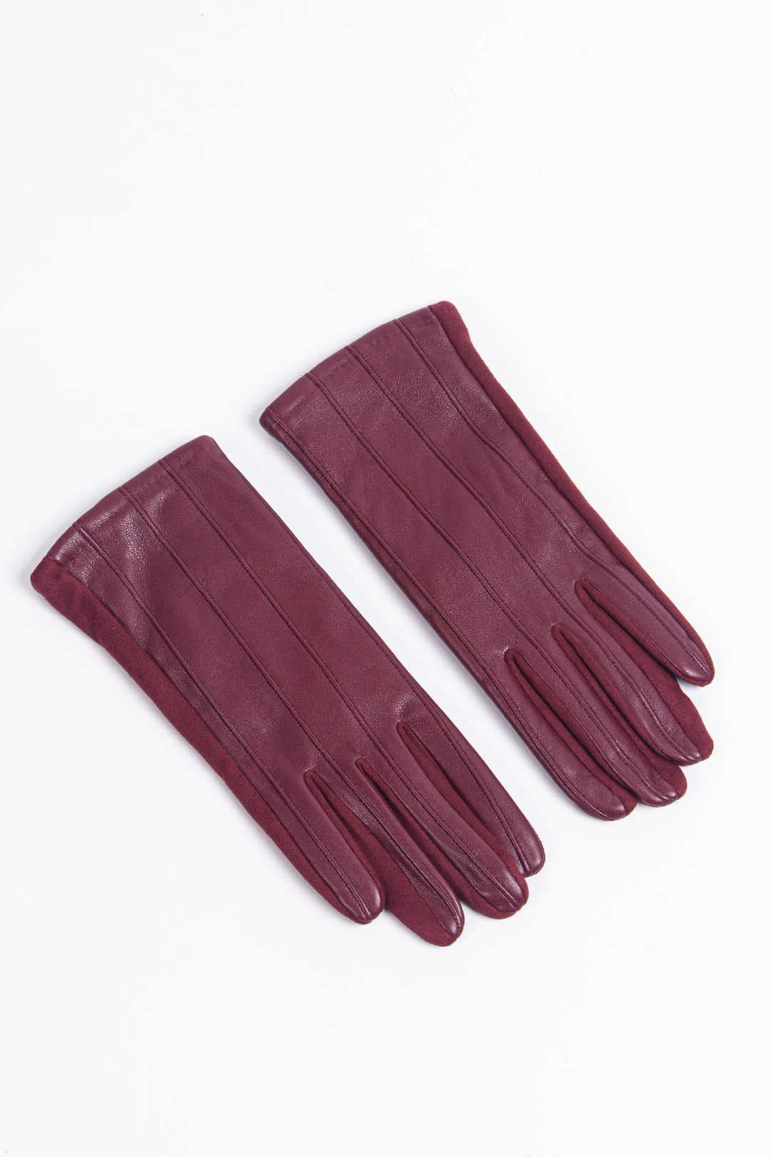 close up of the back of the berry red lined gloves showing the classic vertical stitching