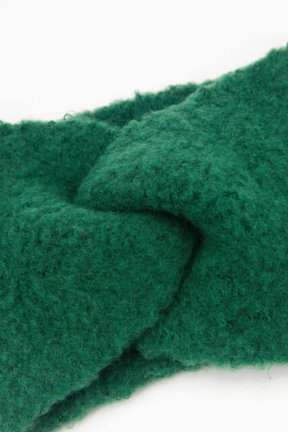 close up of the twist front on the knitted headband